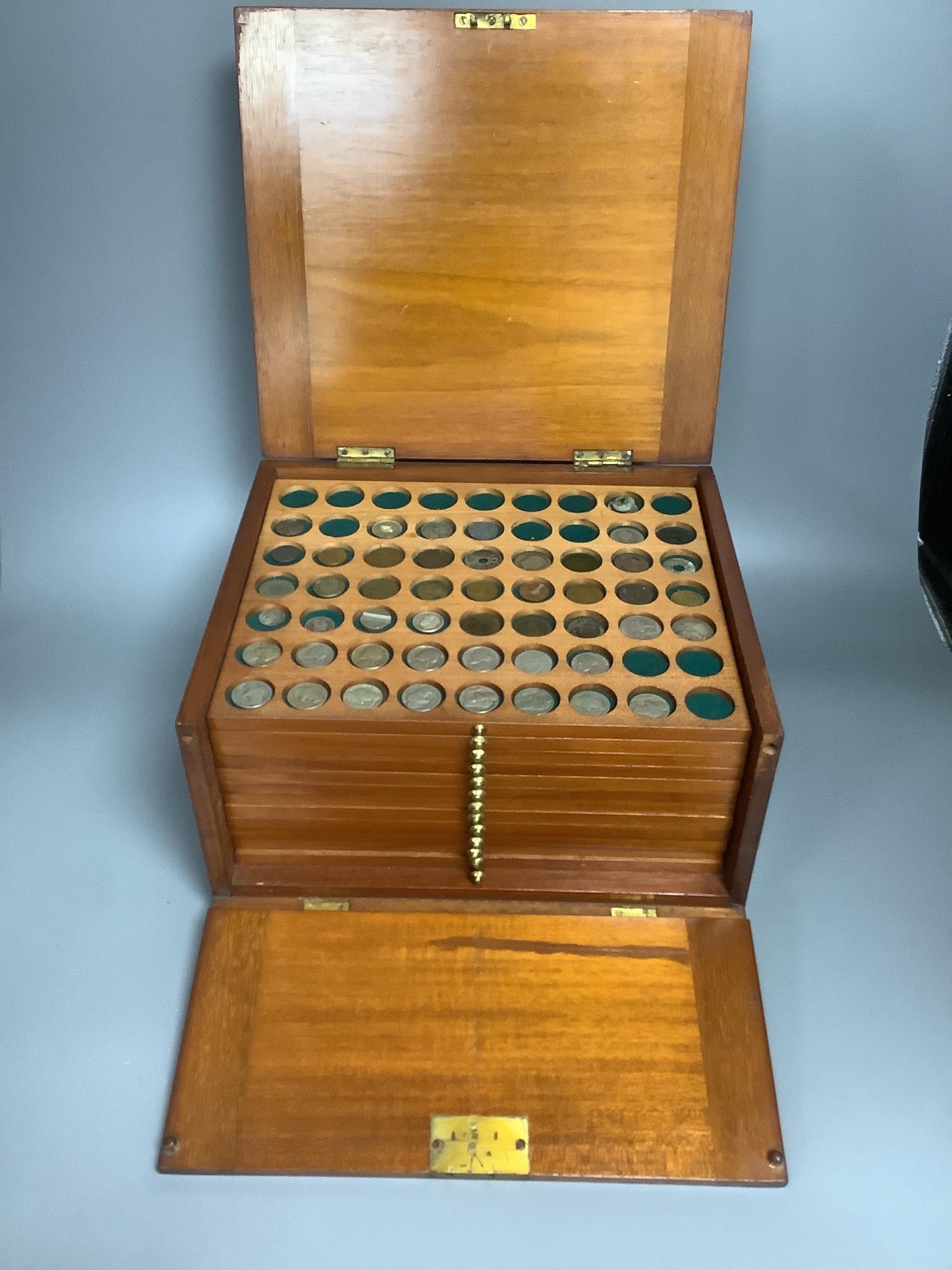 A coin collection in a coin collector's case, 30 x 26 x 17cm